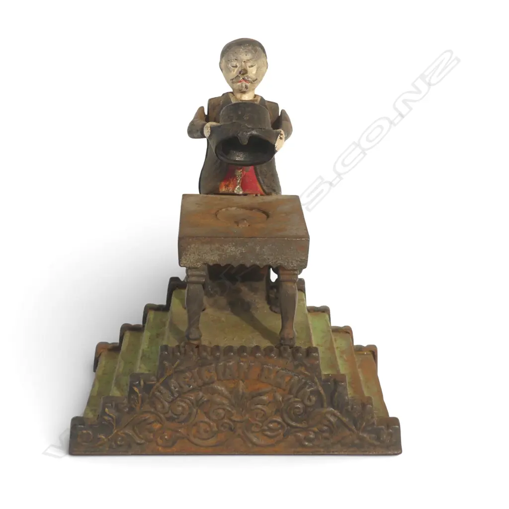 ANTIQUE CAST IRON MECHANICAL 'MAGICIAN BANK' MONEY BANK missing bottom coin plate H.200mm Image 1++