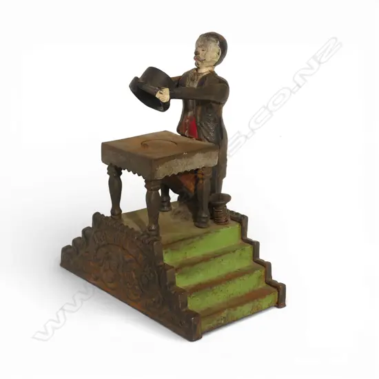 ANTIQUE CAST IRON MECHANICAL 'MAGICIAN BANK' MONEY BANK missing bottom coin plate H.200mm
