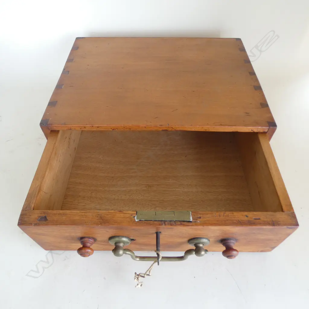 A late 19c. colonial kauri single drawer box.  Dove tailed. Brass and wood handles plus key W.380mm Image 1++