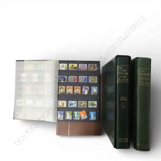 4 STAMP ALBUMS WORLD STAMPS