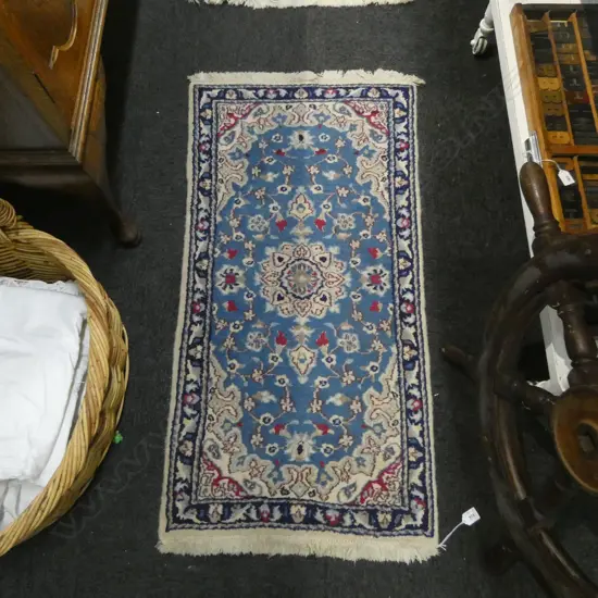 HAND KNOTTED WOOL PILE RUG cetral medallion on blue ground