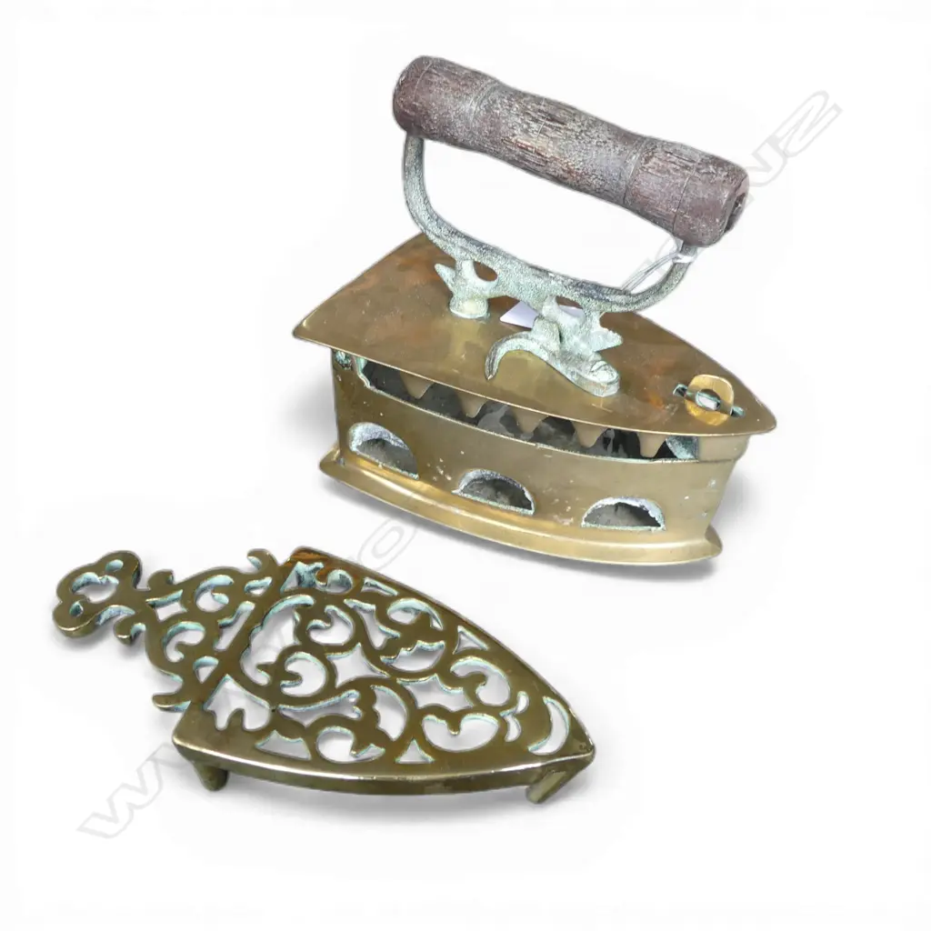 An old brass charcoal iron on smaller brass trivot Image 1++