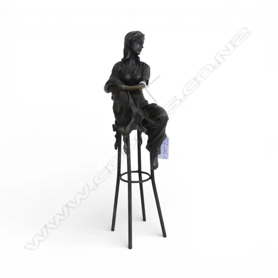 20THc BRONZE WOMAN SEATED ON A TALL STOOL. H.270mm