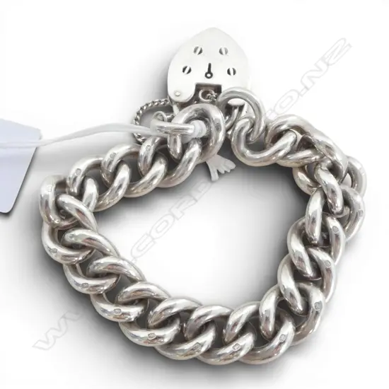 VERY HEAVY CAST SILVER CURB LINK BRACELET with large heart padlock clasp. 123gms