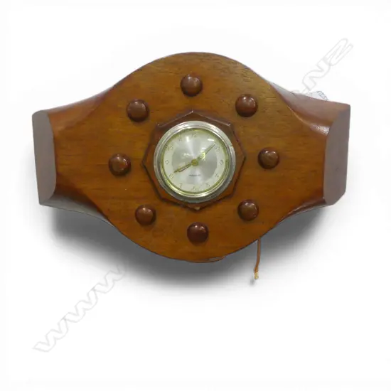 VINTAGE MEREDES WALL CLOCK fitted to a mahogany propeller central section. L.400mm