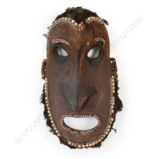 A large PNG carved wooden mask,