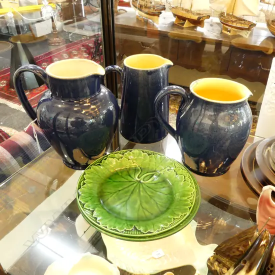 3 BLUE GLAZED DENBY JUGS H.195mm + 2 MAJOLICA LEAF PLATES 210mm dia (1 w. HAIRLINE)