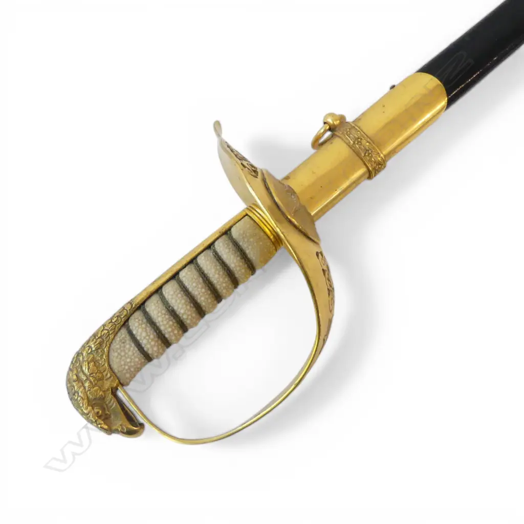 BRITISH ROYAL AIRFORCE OFFICER'S CEREMONIAL WILKINSON SWORD. QEII. Gilded brass. Shagreen grip. In scabbard Image 1++