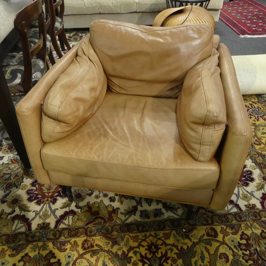 WEST ELM ABIGAL STYLE CLUB CHAIR in tan leather. Zippered cushions. Labelled Farmers. Image 1++