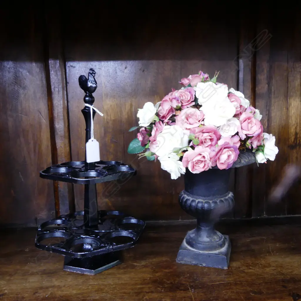 2 PCES BLACK PAINTED CAST IRON; EGG HOLDER H.310mm & URN w. FAUX FLOWERS H.290mm Image 1++