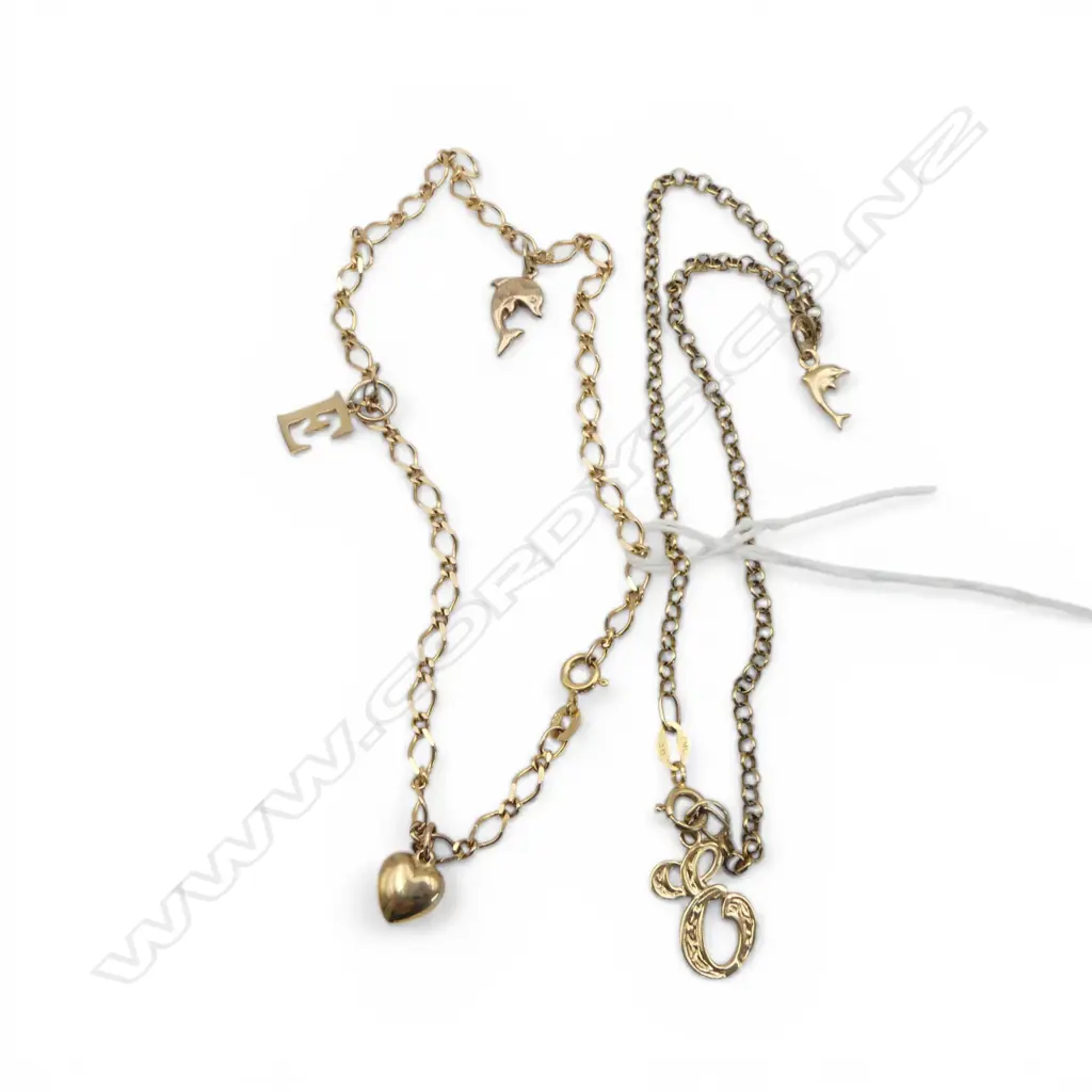 TWO 9CT GOLD CHAIN AND CHARMS 8.76gms Image 1++