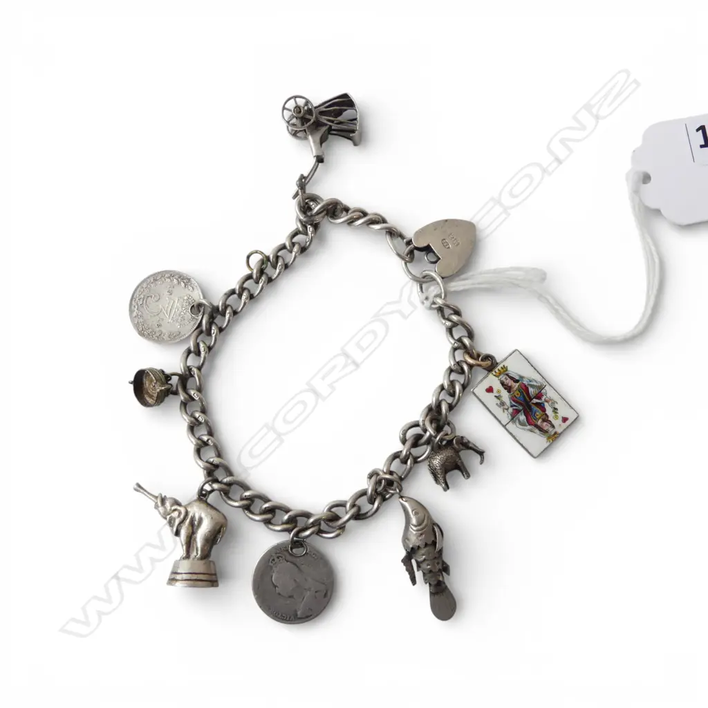 SILVER CHARM BRACELET 32.83gms Image 1++