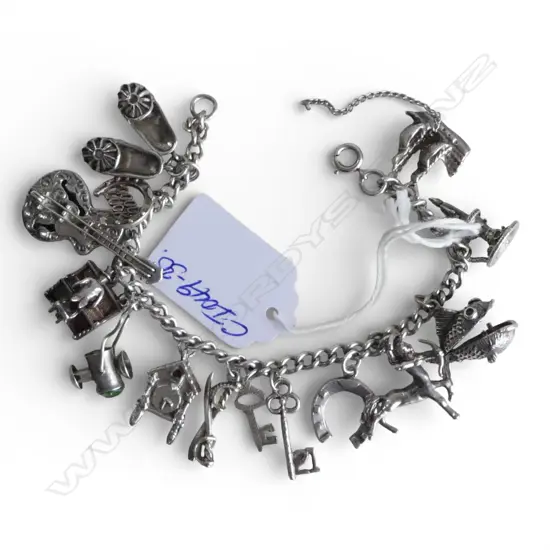 SILVER CHARM BRACELET piano player + hinged fish + guitar + centaur + clock etc 48gms