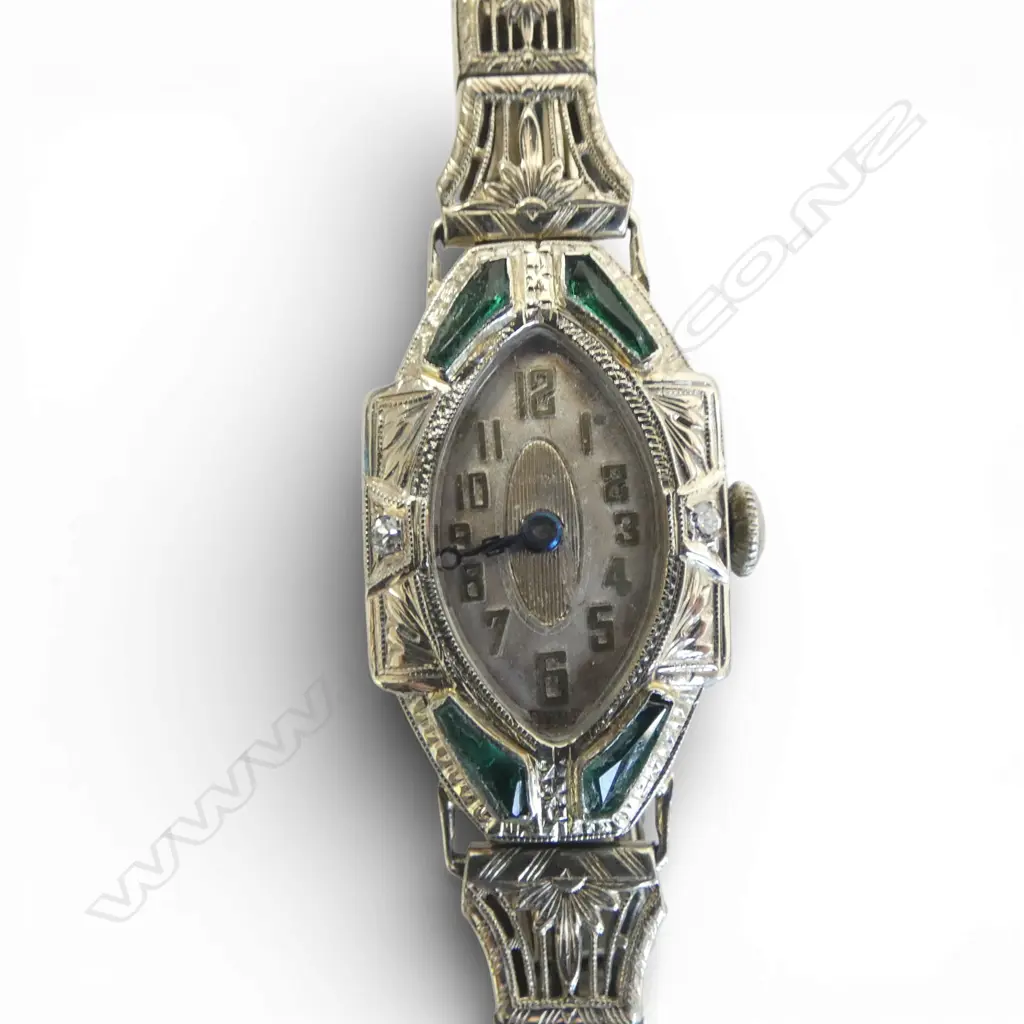 18ct WHITE GOLD DECO WATCH 2x small diamonds & green stones, going but needs o/haul. Plated strap. Image 1++