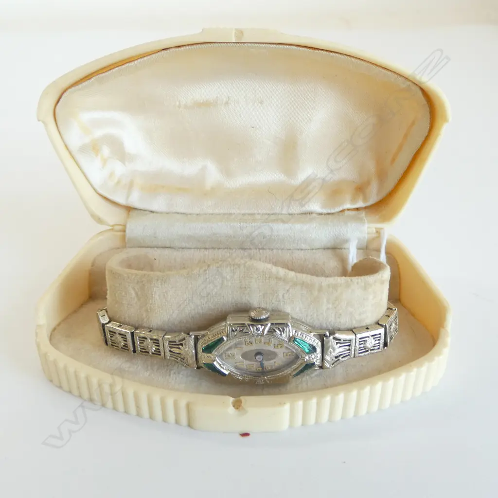18ct WHITE GOLD DECO WATCH 2x small diamonds & green stones, going but needs o/haul. Plated strap. Image 1++