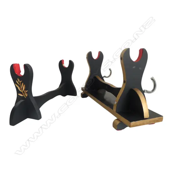 TWO JAPANESE BLACK LACQUER SWORD STANDS: BOTH FOR ONE SWORD