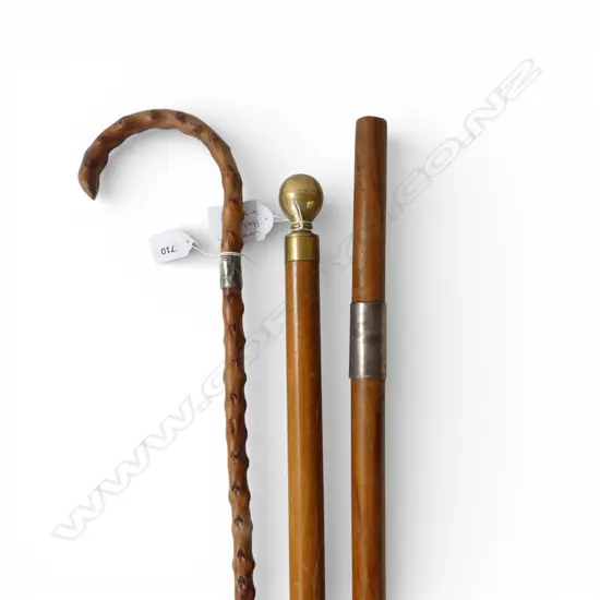 2 WALKING STICKS one with stg silver collar & other BRASS topped unscrewing to pool cue L.940mm
