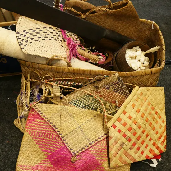 ASST. TRIBAL PIECES IN WOVEN BASKET