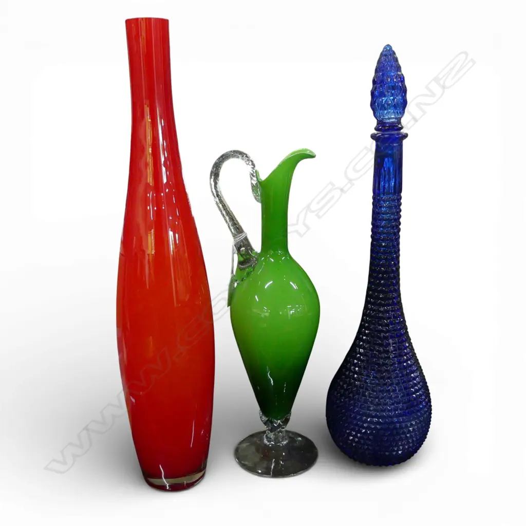 3 PCES GLASS; RED VASE H.490mm, GREEN JUG, BLUE GENIE BOTTLE H.465mm Image 1++