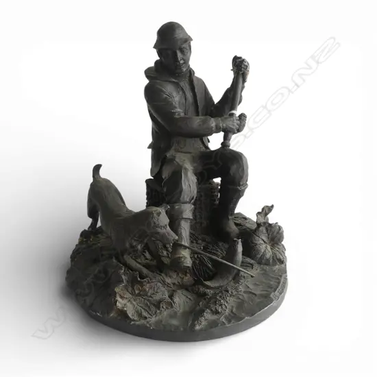 BRONZED RESIN SCULPTURE of a fisherman w fish & dog M.220mm. The rod broken