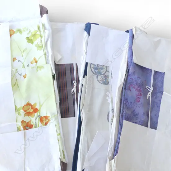 FOUR VINTAGE KIMONO IN ORIGINAL PACKAGING
