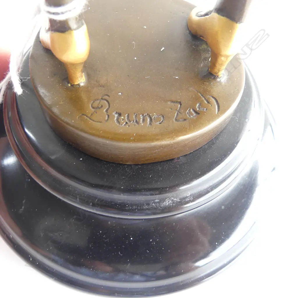 ART DECO STYLE BRONZE FIGURINE 'The Riding Crop' after Bruno Zach. Gilded highlights. On black stone base. H.355mm Image 1++