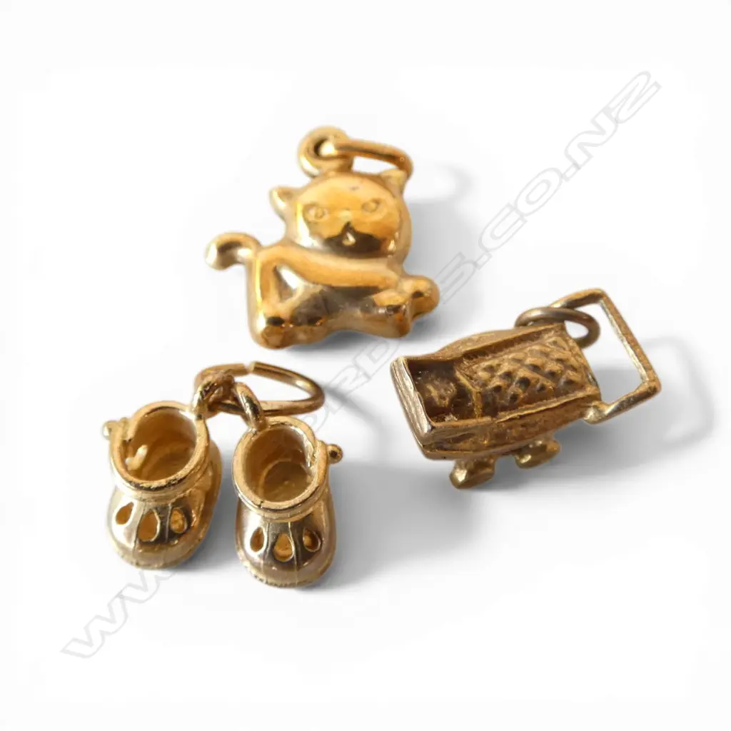3 GOLD CHARMS: 2 X 9CT pram & pr shoes + 10ct cat. 3.5gms Image 1++