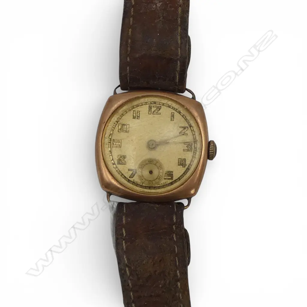 1920'S 9ct ROSE GOLD GENT'S WRISTWATCH running no seconds hand. Showing wear Image 1++