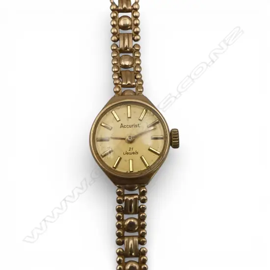 VINTAGE ACCURIST 9ct GOLD LADIES WRISTWATCH w 9ct strap 7.65gms excludes movement includes glass. Total weight 10.63gms 