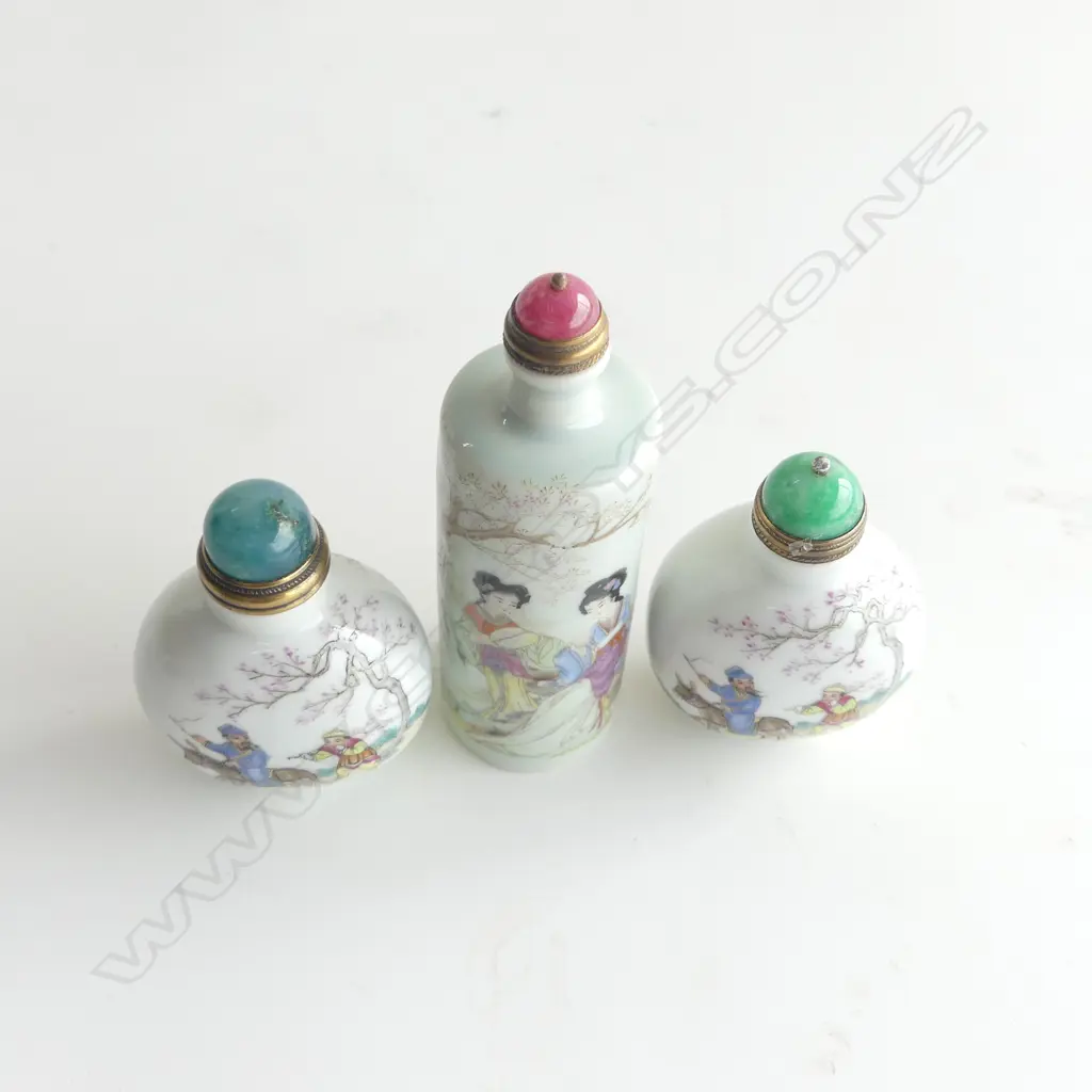 THREE CHINESE FAMILLE ROSE SNUFF BOTTLES 110mm (H) Largest Image 1++