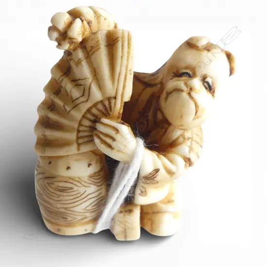 JAPANESE CARVED IVORY FIGURE masked figure, signed H.35mm