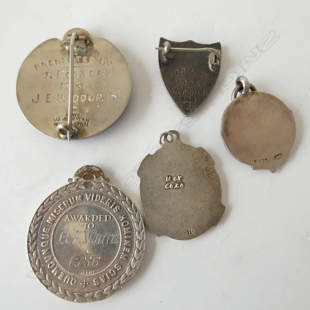 7 ASST. EARLY/MID 20thC N.Z. SILVER PENDANTS & PINS etc 64gms approx. Image 1++