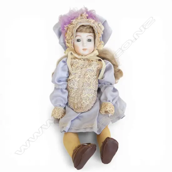 late 20thC PORCELAIN HEADED DOLL H.450mm period clothes 