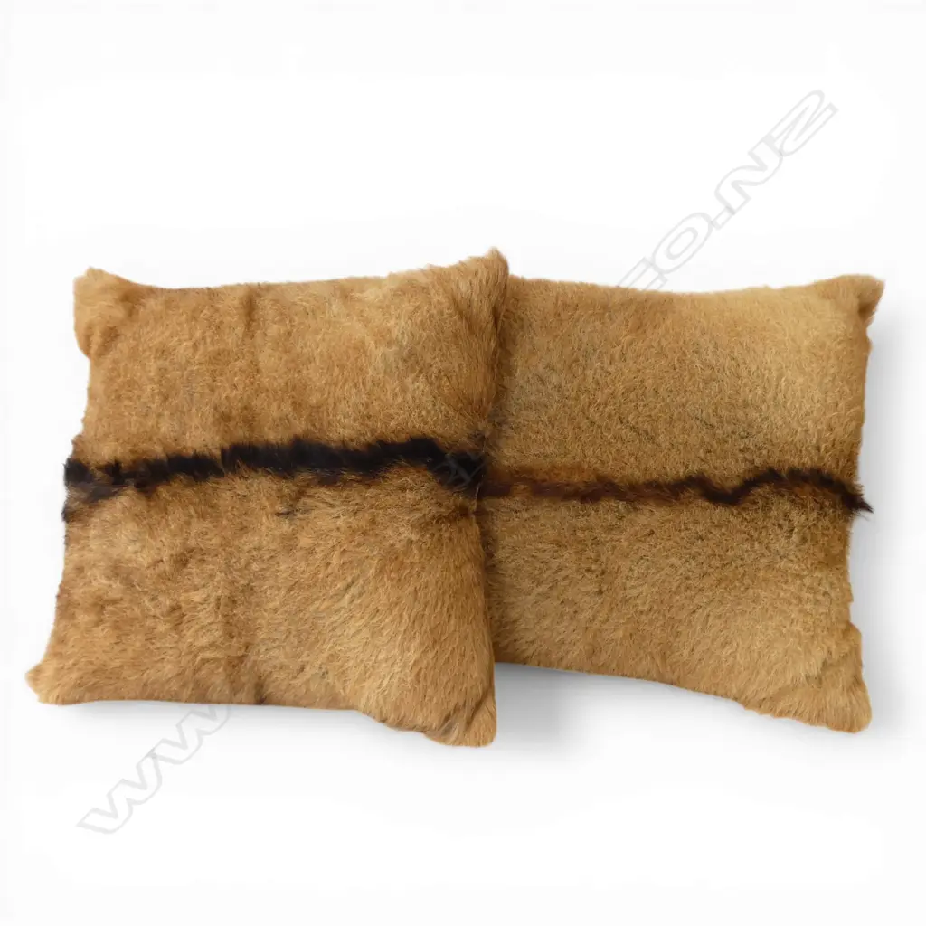 A PAIR OF ANIMAL HIDE CUSHIONS 440 MM SQ Image 1++