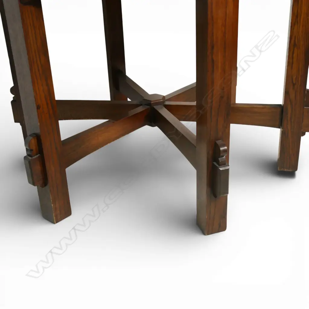 An uncommon Arts & Crafts oak hexagonal table and six shaped chair set, Image 1++