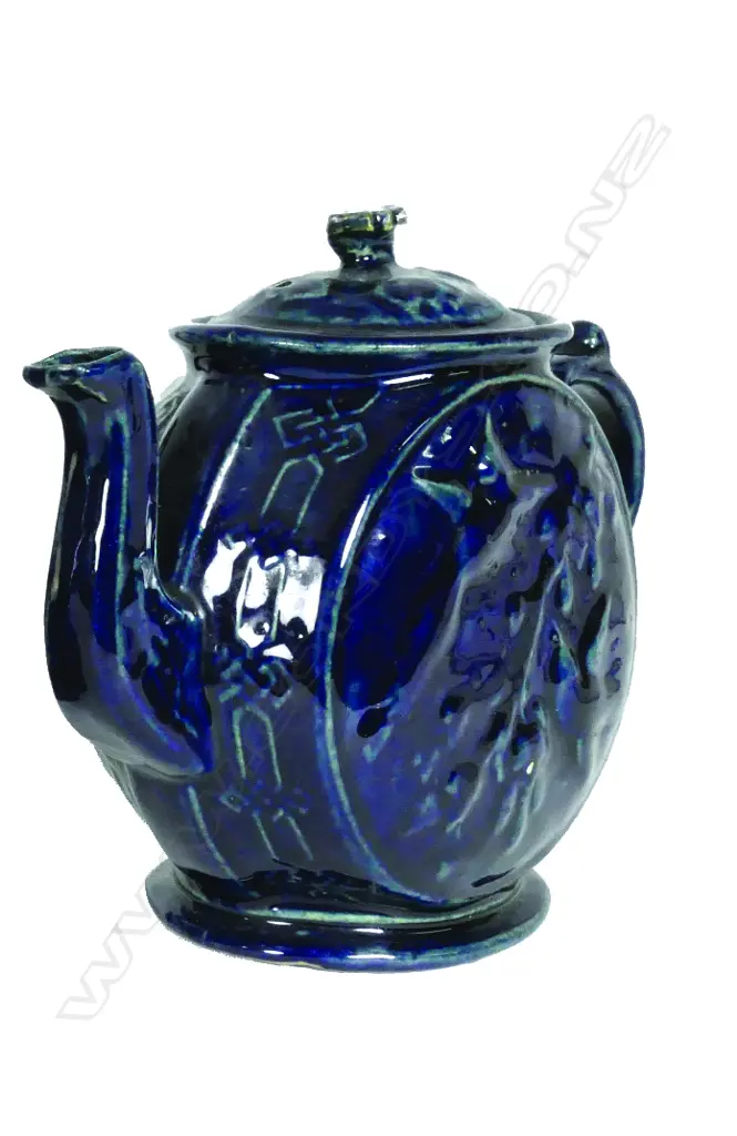 A late 19thC N.Z. Luke Adams 'Kowhai' blue glazed teapot Image 1++