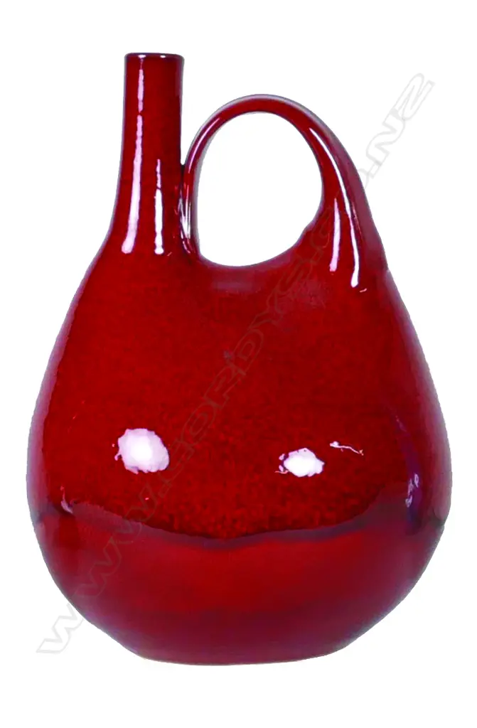 Len Castle ceremonial pourer in a striking lava red glaze Image 1++