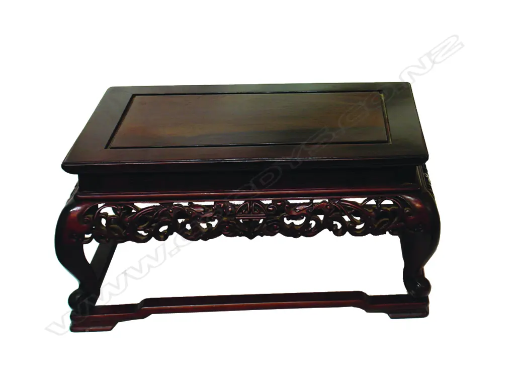 A Chinese carved hardwood small low vase table Image 1++