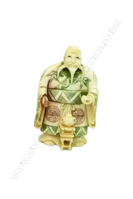 An ivory netsuke Image 1++