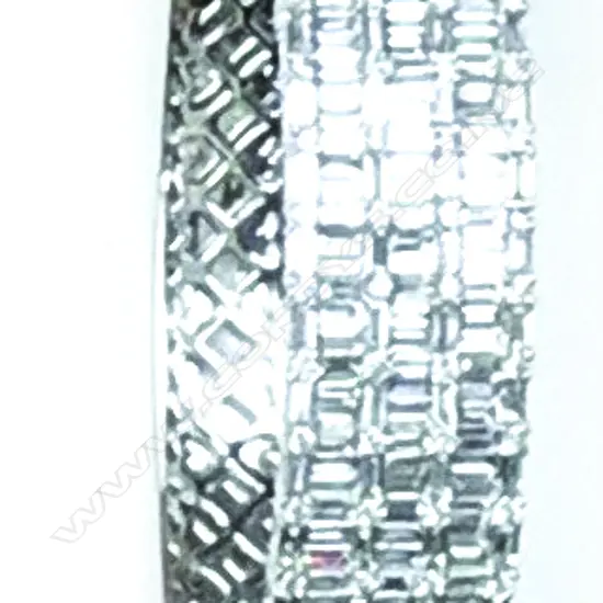An impressive lady's modern 18ct. white gold and diamond hinged bangle