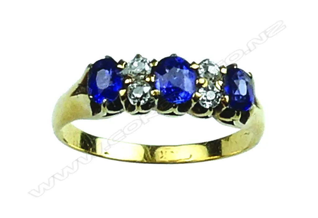 A vintage lady's 18ct. yellow gold sapphire and diamond bridge ring Image 1++