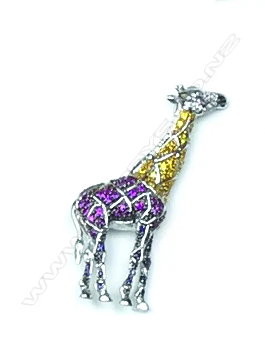A 9ct. white gold and variously coloured sapphire giraffe brooch Image 1++