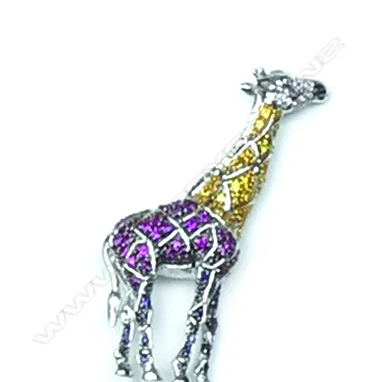 A 9ct. white gold and variously coloured sapphire giraffe brooch