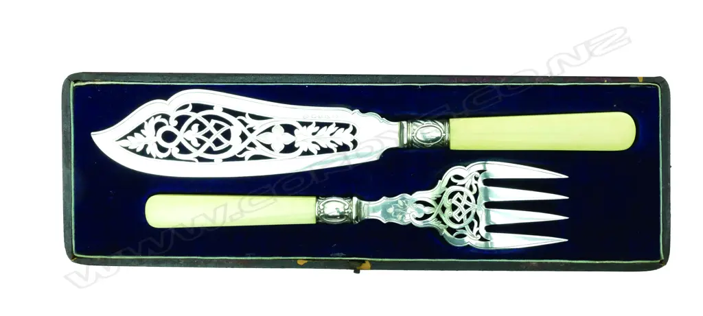 A pair of silver plate and ivory handled fish servers Image 1++