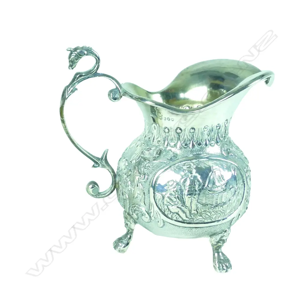 A Dutch silver baluster tripod cream jug Image 1++