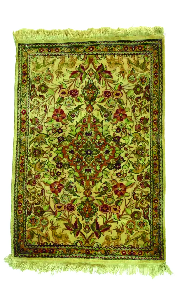 An Iranian Qum silk pile rug Image 1++