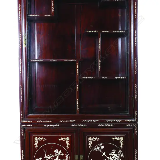 A pair of fine quality Chinese rosewood two-stage display cabinets