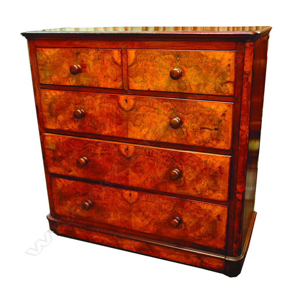 A Victorian mahogany and walnut chest of drawers Image 1++