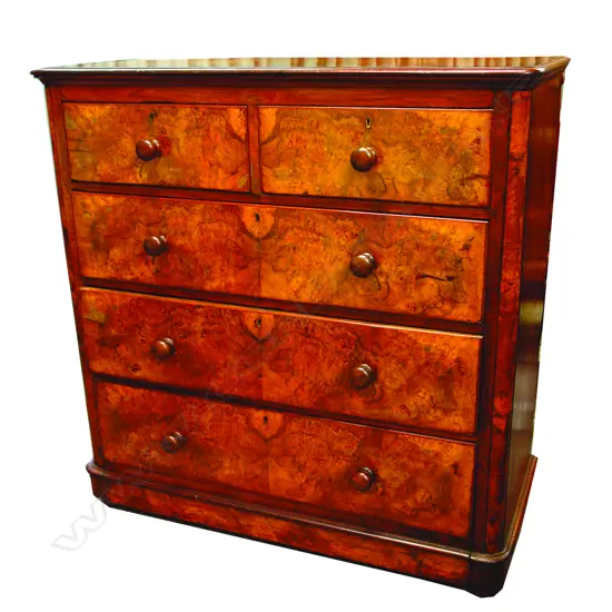 A Victorian mahogany and walnut chest of drawers