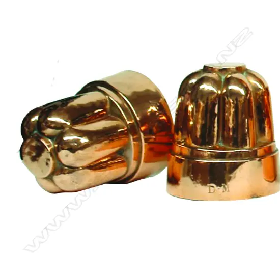 A pair of Victorian copper jelly moulds